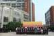 The distinguished guests pictured in front of the Mong Man Wai Building.